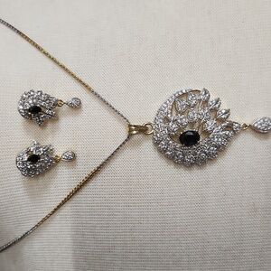 Elegant Gold and Silver Pendant Necklace